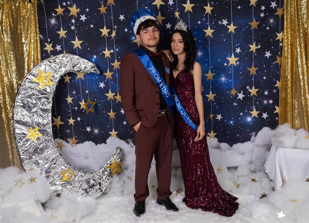  Prom king and queen posing